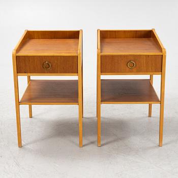 A pair of teak veneered bedside table, mid 20th Century.