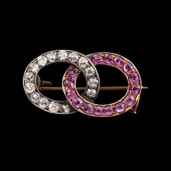 1171. A single cut diamond and ruby brooch.