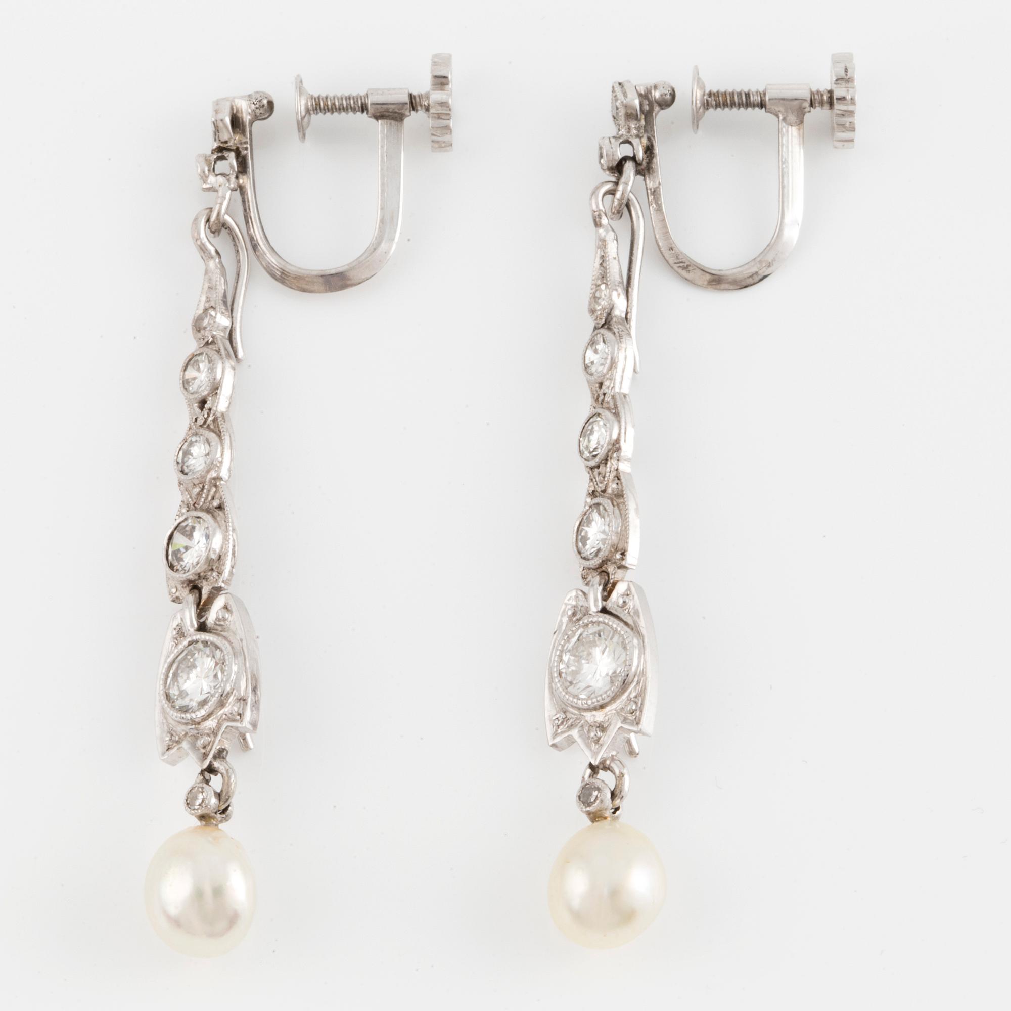 A pair of 18K white gold brilliant-cut and pearl earrings.