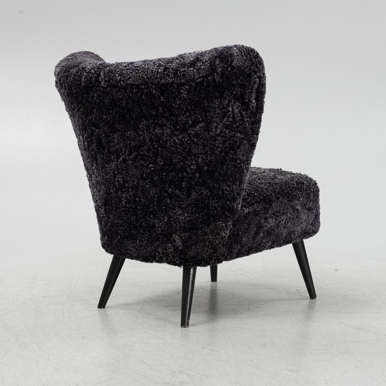 An armchair, mid 20th Century.