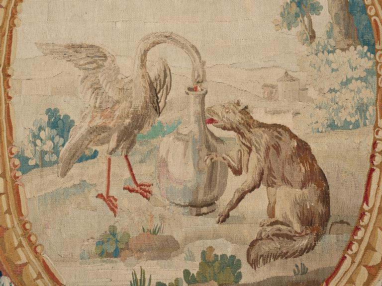 A TAPESTRY, tapestry weave, "The stork invites the fox to dinner", ca 274,5-277,5 x 181,5-183 cm, Aubusson around 1780.