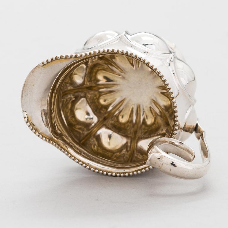 GUSTAF ADOLF BJÖRKLUND, Strösked, gräddsnäcka och skedar, silver, totalt 18 delar, Joensuu, Finland 1870.