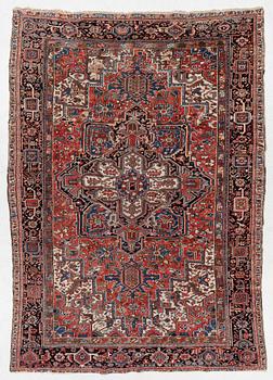 An antique Heriz carpet, west Persia, c. 333 x 238 cm.