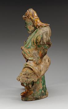 A large sancai glazed roof tile figure of a warrior, Ming dynasty, 17th Century.