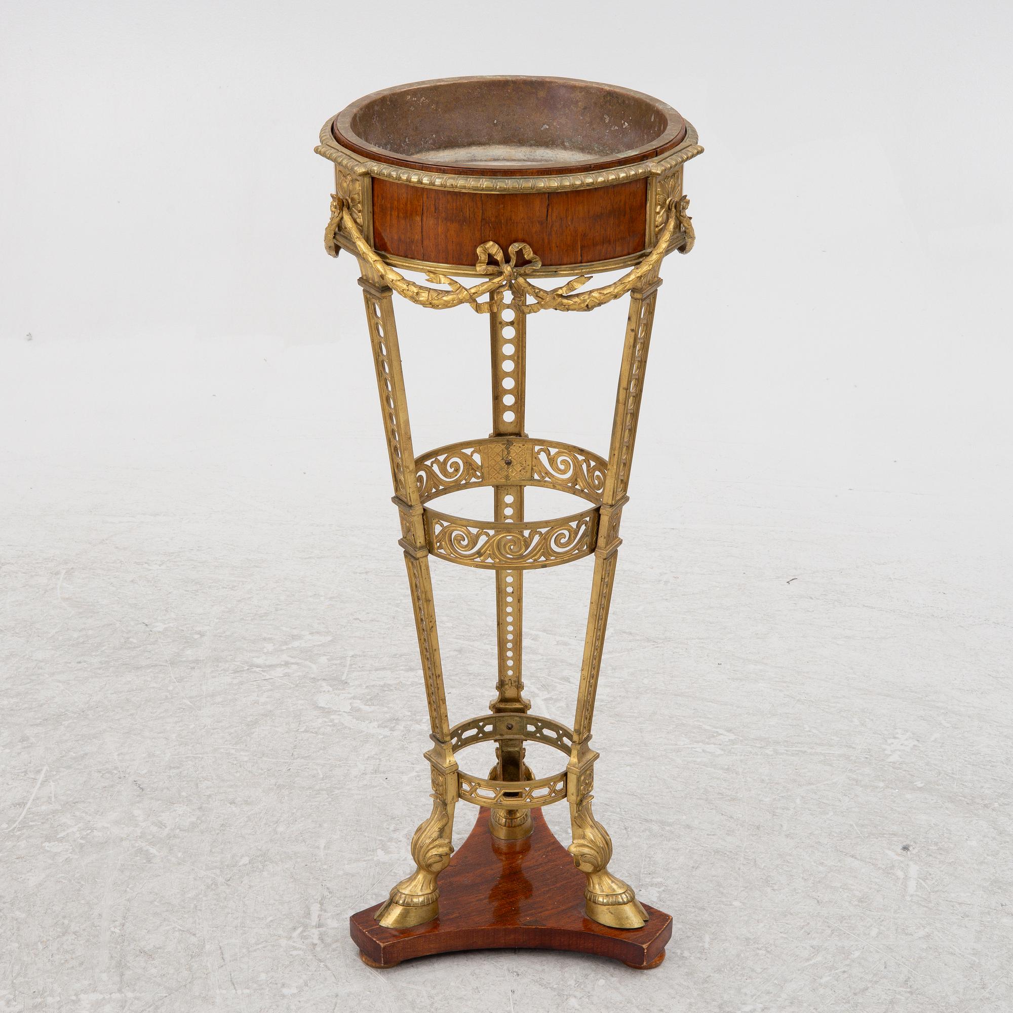 An Empire style flower table, circa 1900.