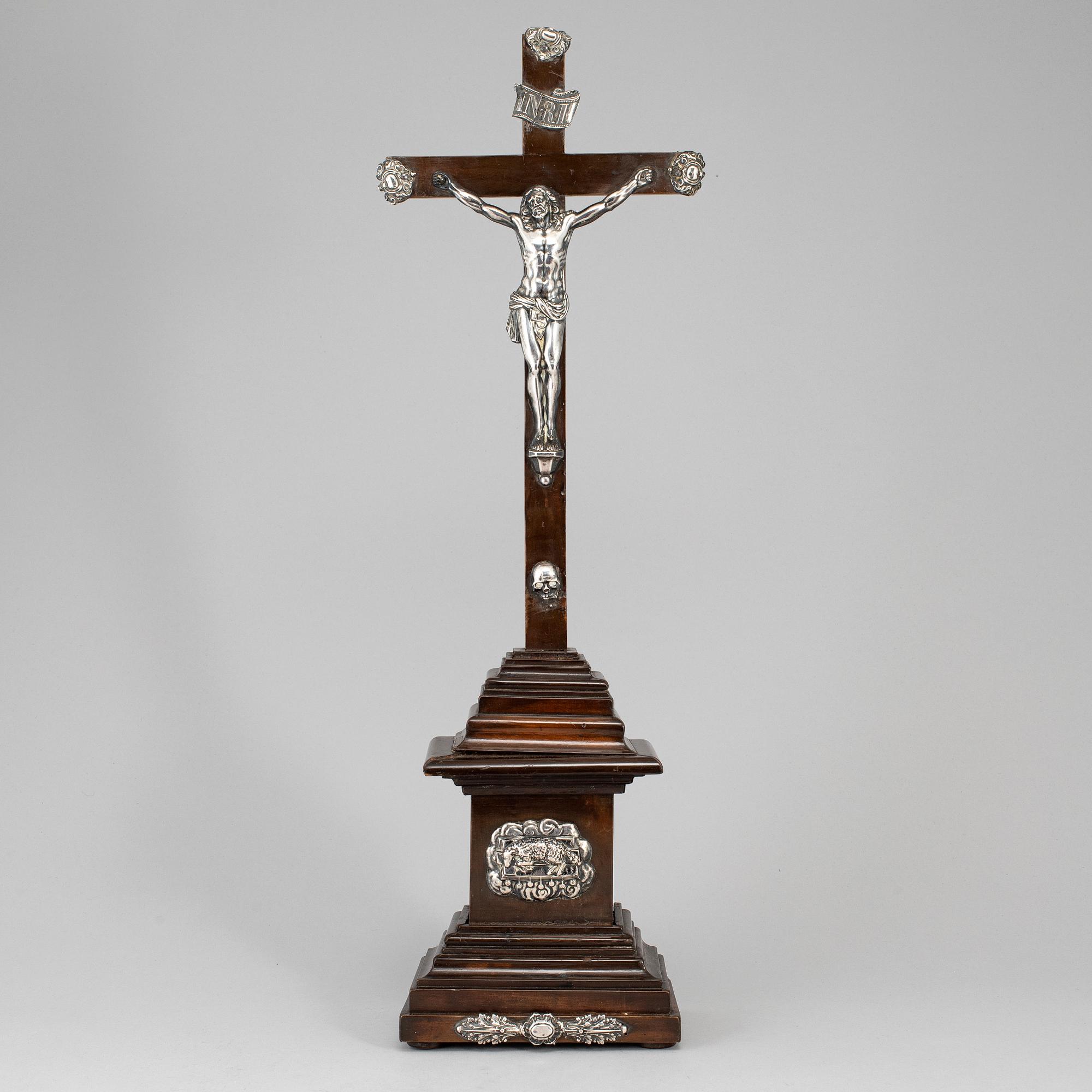 An 18th century silver and wood crucifix.