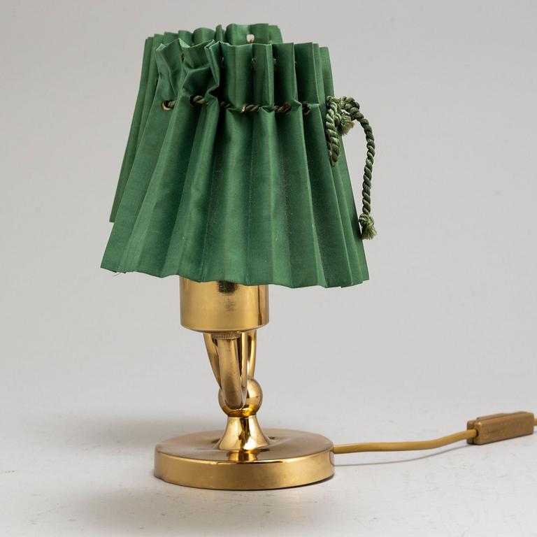 JOSEF FRANK, a brass table lamp for two lights, model 2483, Svenskt Tenn, provenance Estrid Ericson.