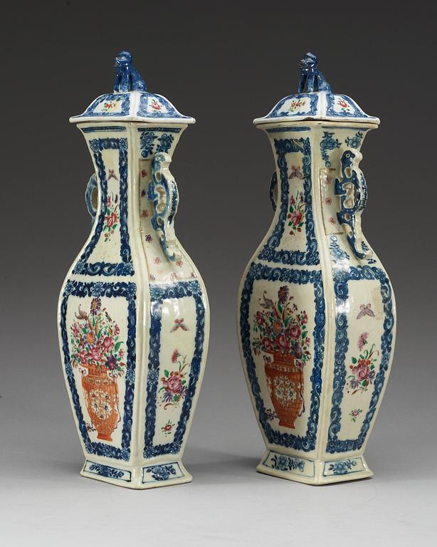 A pair of famille rose vases with covers, Qing dynasty, Qianlong (1736-95).