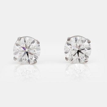 A pair of earrings with brilliant-cut diamonds 3.02cts in total, quality G/VS2. Certificates from IGI.