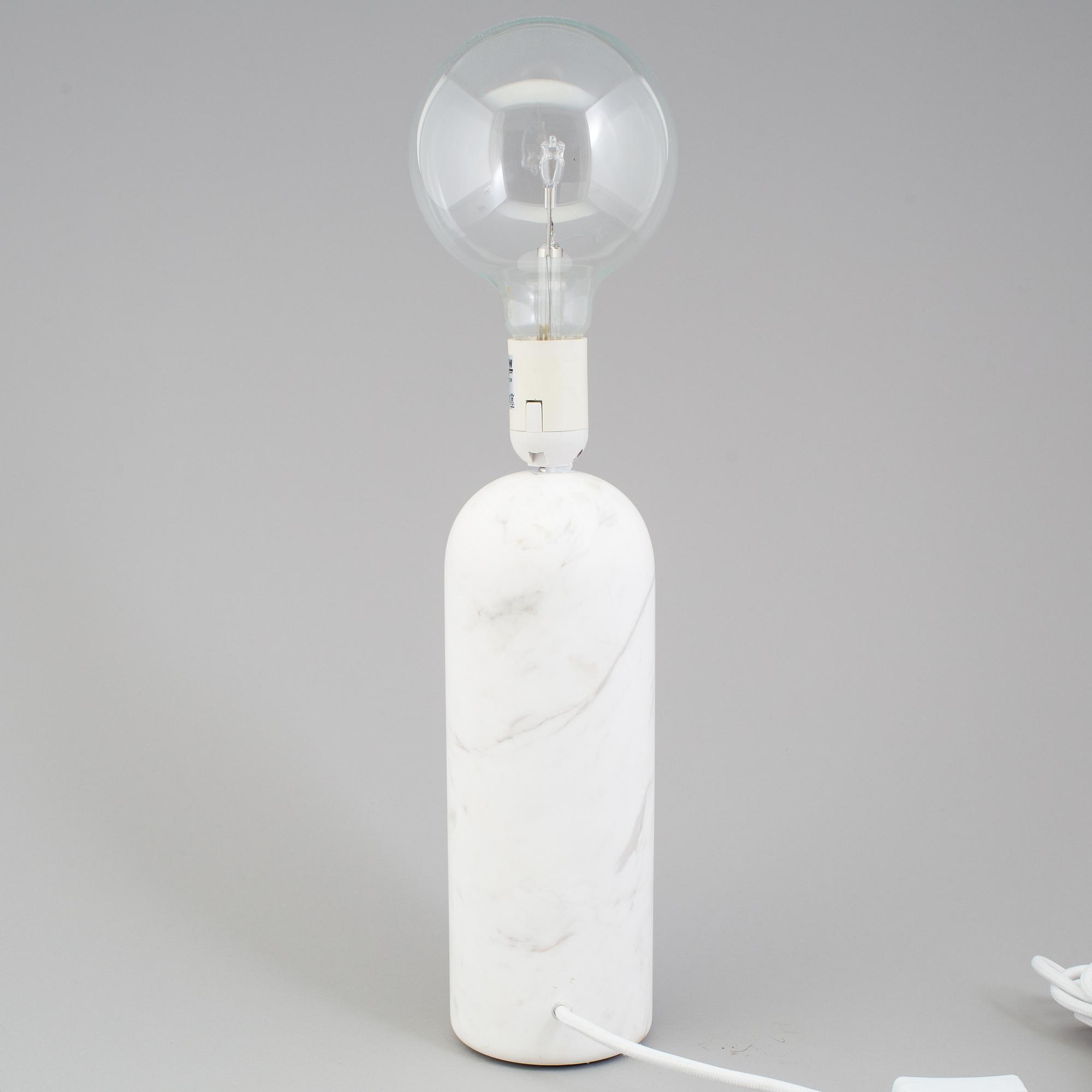 a "Kizu" table lamp by Lars Tornoe for New works.