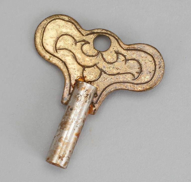 BORDSPENDYL, mässing och emalj, 1900-tal, troligen Kina.