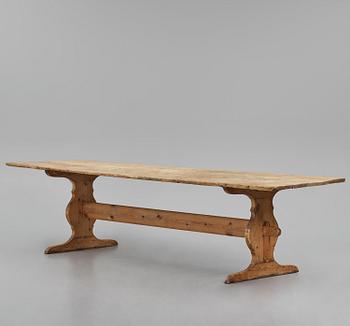 A pine trestle table, 20th century incorporating older elements.