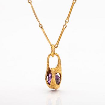 BJÖRN WECKSTRÖM, A 14K gold pendant "Reindeer clock" with an amethyst and chain "Raito". Lapponia 1978  and 1982.