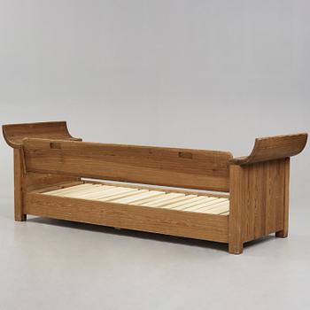 An Axel Einar Hjorth stained pine sofa 'Sandhamn', Nordiska Kompaniet 1933.