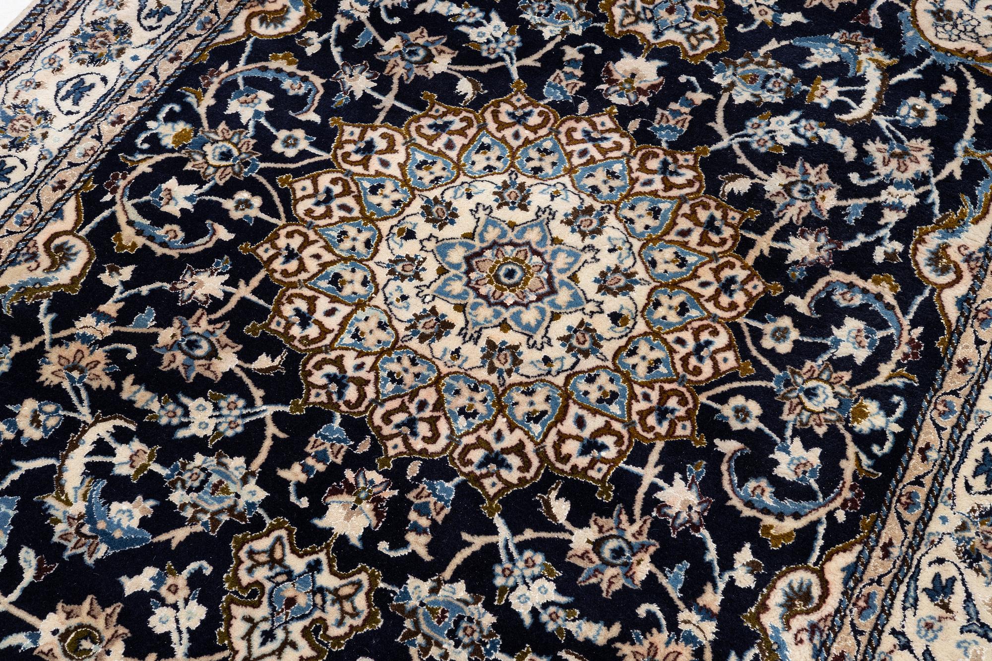 A Nain carpet, Central Persia, c. 300 x 195 cm.