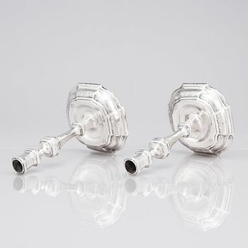 A pair of Swedish early 18th century silver candlesticks, mark of Petter Ersson Lund, Stockholm 1727.