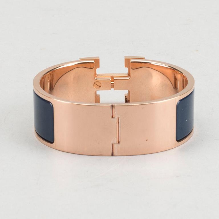 A Hermès "Clic-H" bracelet.