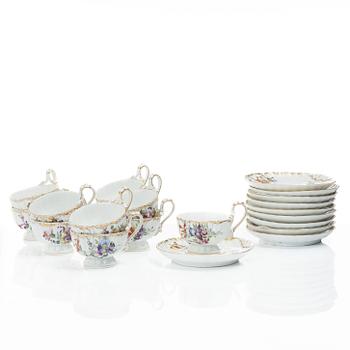 A set of ten porcelain coffee cups with saucers, Meissen-like mark, first half of the 20th Century.
