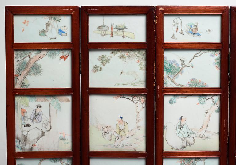 A Chinese folding screen with 48 porcelain tiles, late Qing dynasty, signed Ren Huanzhang, and dated 1881.