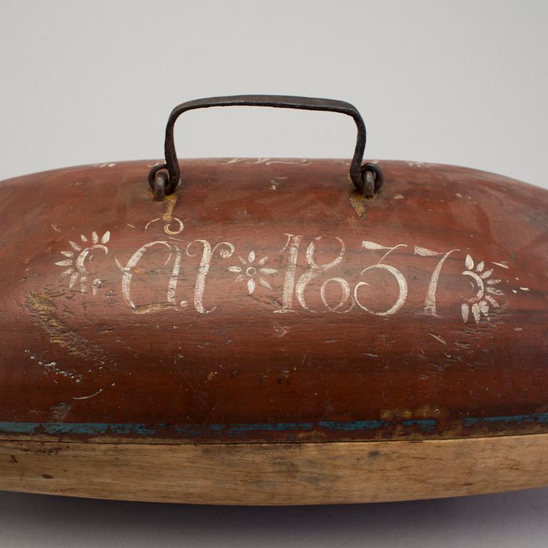 A painted folk art trough dated 1837.