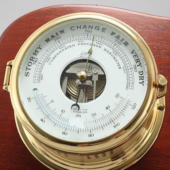 A wall clock and a barometer from Schatz.