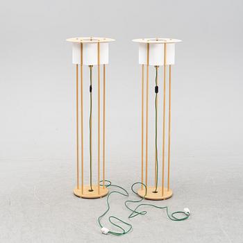 Torbjörn Ahlström, a pair of birch floor lights, dated 1993.