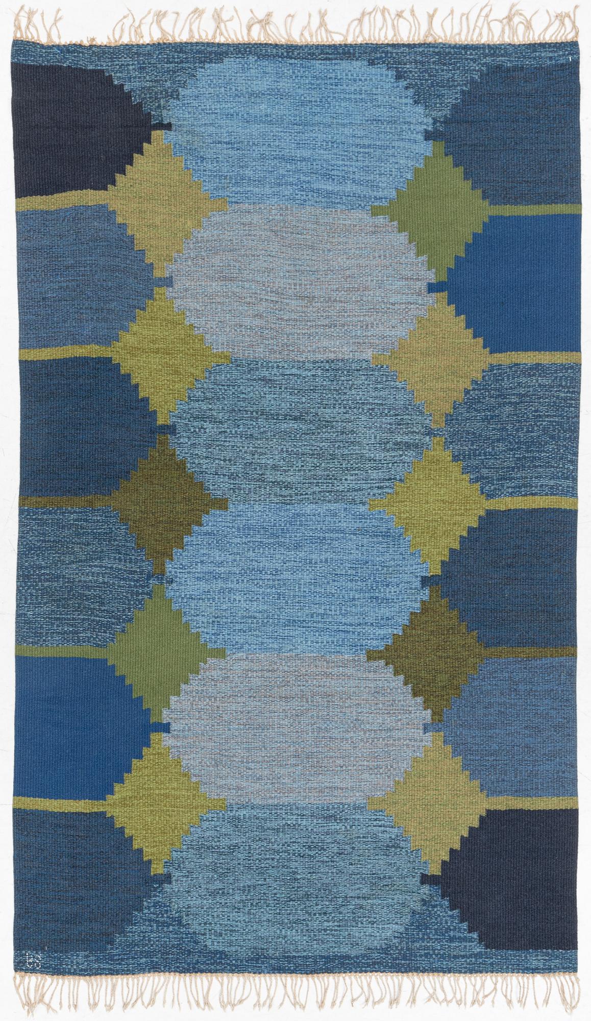 A flat weave carpet, c. 252 x 153 cm signed BS.