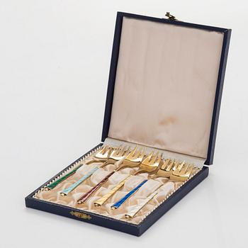 Six gilded silver and enamel forks, E Lauritsen, Denmark mid-20th century.