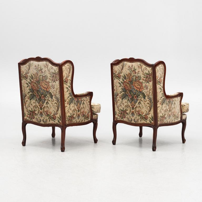 A pair of Louis XV-style armchairs, mid 20th Century.