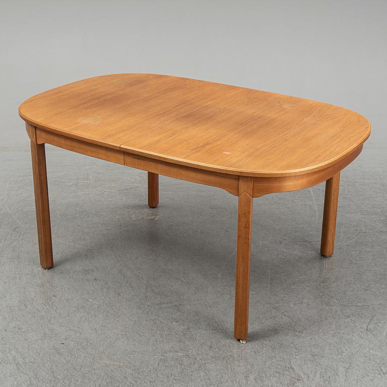 A five-piece walnut 'Ambassadör' dining suite by Carl Malmsten.