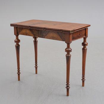 A late 19th century mahogany card table.
