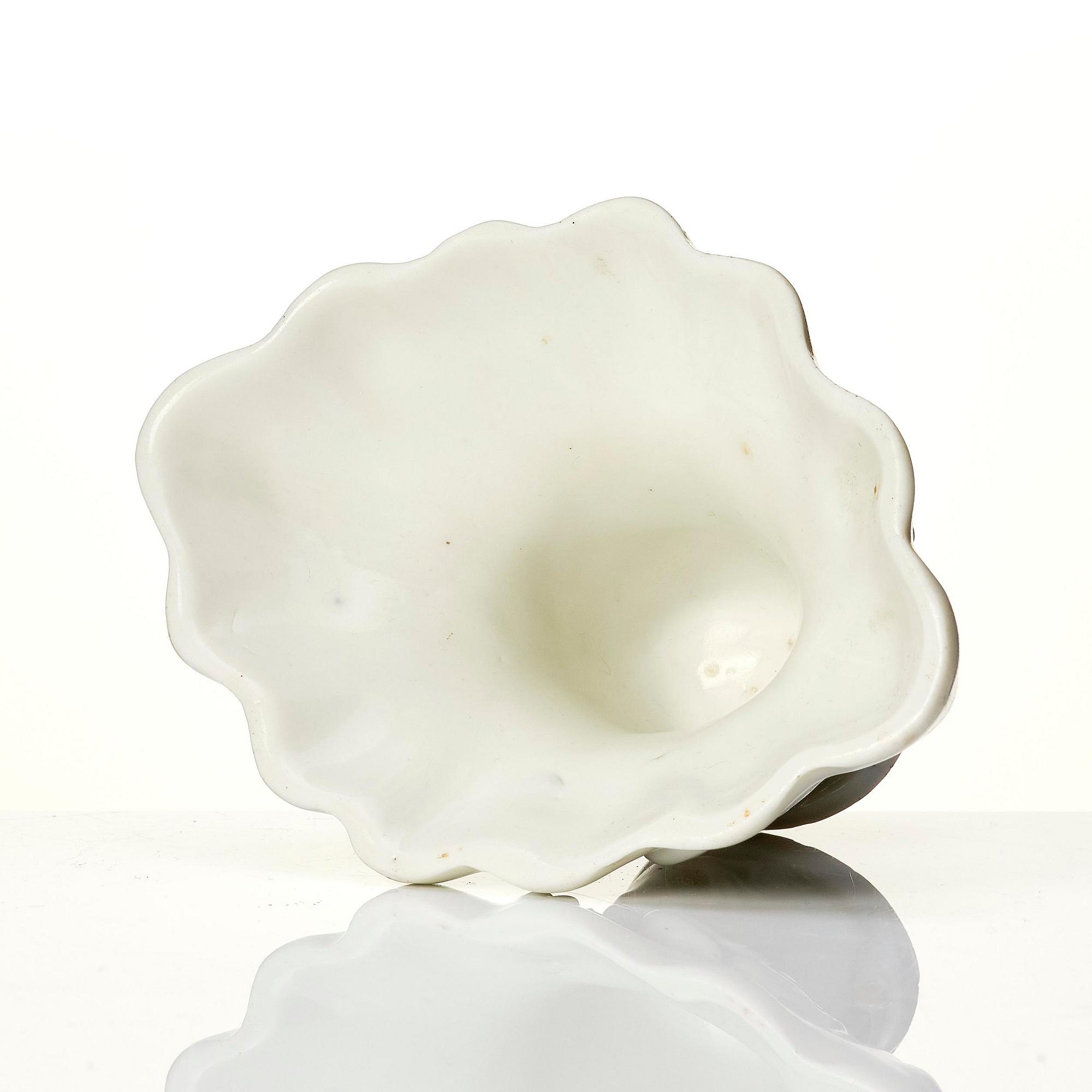 A blanc de chine libation cup, Qing dynasty, 18th century.