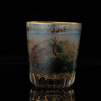 A Bohemian beaker glass, dated Carlsbad 1824.