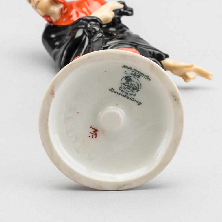 KARL TUTTER,  a signed porcelain figurine.