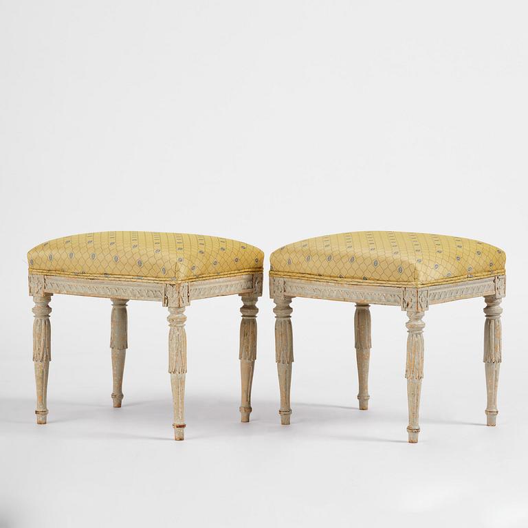 A pair of late Gustavian stools by J. E. Höglander (master in Stockholm 1777-1813).