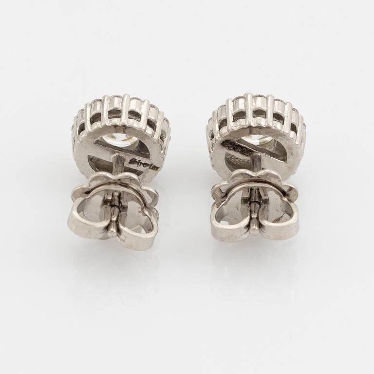 Brilliant cut diamond earrings.