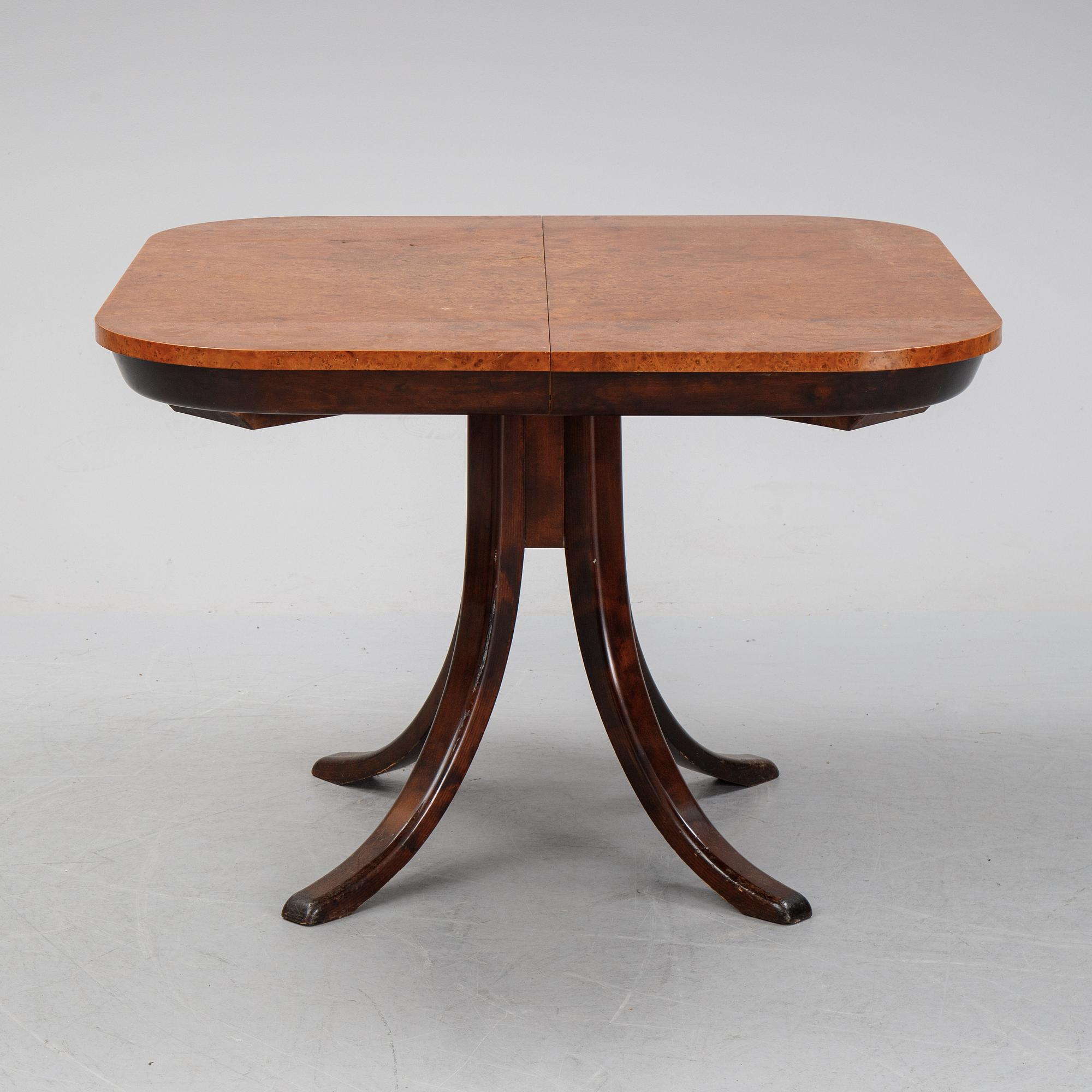 Axel Einar Hjorth, A root veneered dining table, Nordiska Kompaniet, 1938.