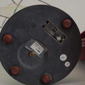 a set of three plastic and bakelite fans, mid 20th century.