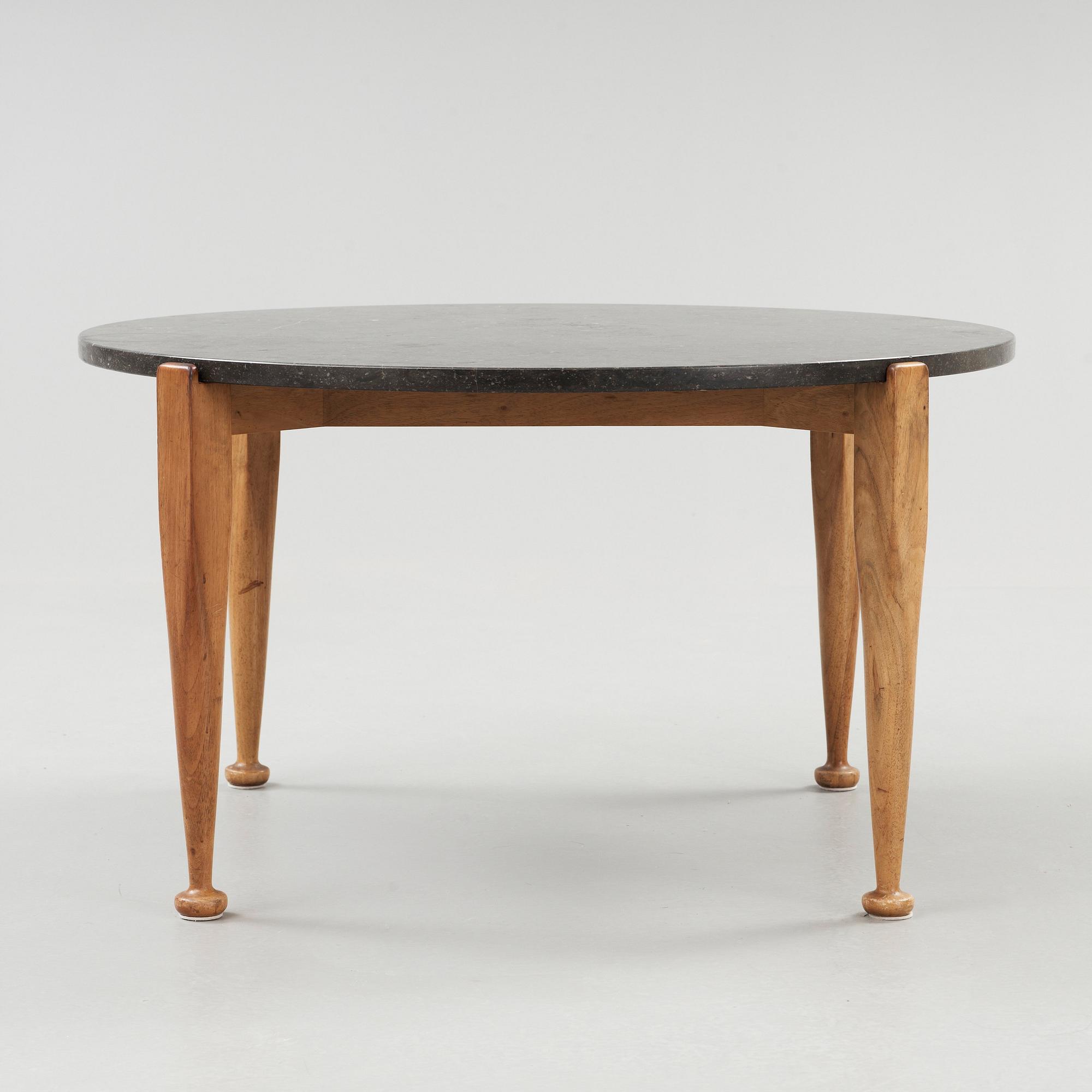 A Josef Frank black marble top table, walnut based, Svenskt Tenn, model 960.