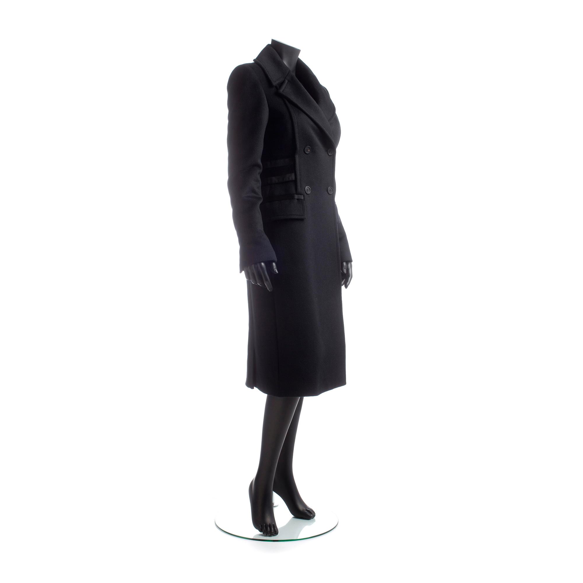 GUCCI, a black wool blend coat.