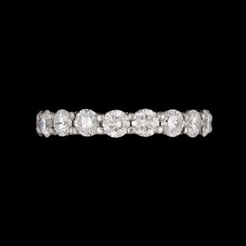 1037. A diamond tot. app. 3 cts eternity ring.