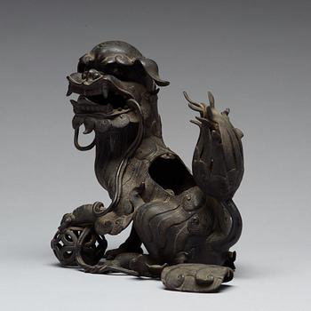 A bronze censer with cover in the shape of a Buddhist lion, Qing dynasty, 19th Century.