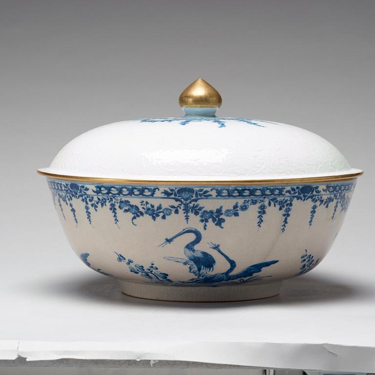 A large blue and white armorial punch bowl with cover, Qing dynasty, Qianlong (1736-95).