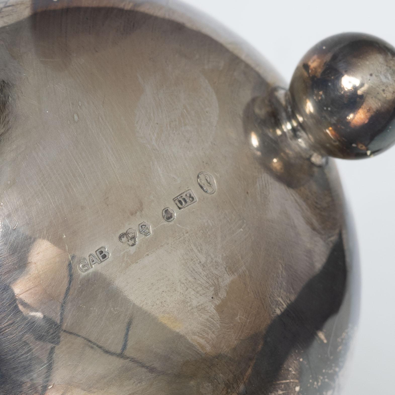 Guldsmedsaktiebolaget (GAB), Pair of similar silver beakers on foot, Stockholm, 1941–1946.