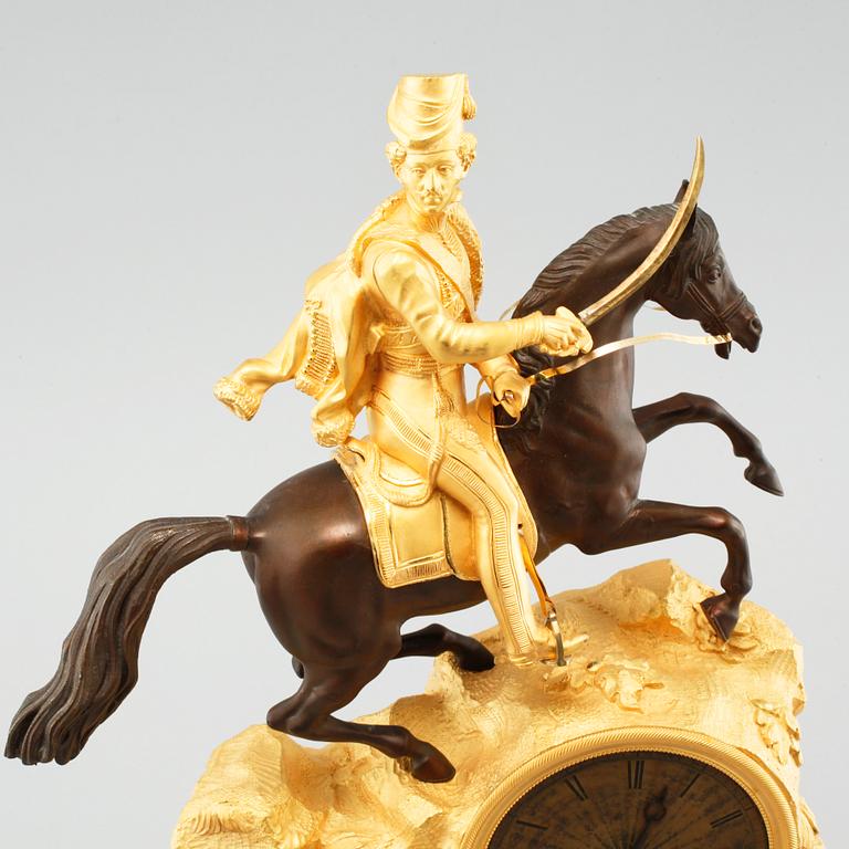 A late empire mantle piece clock, around mid 19th century.