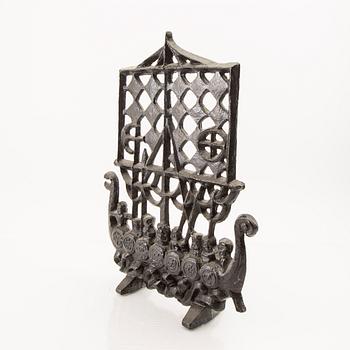 Olle Hermansson, gnistskydd signerad Husqvarna, 1960-tal gjutjärn.