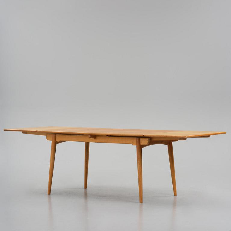 Hans J. Wegner, an "AT-312" dining table, Andreas Tuck, Denmark, 1950s-60s.
