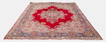 A carpet, Kirman, ca. 333 x 244 cm.