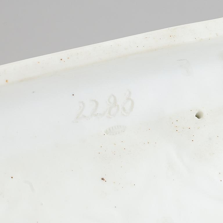 A parian figurine, 'the dying gaul', after an antique sculpture. 20th century.