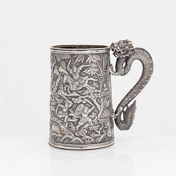 A Chinese export silver battle scene mug, retailer Leeching, latter half of the 19th century.